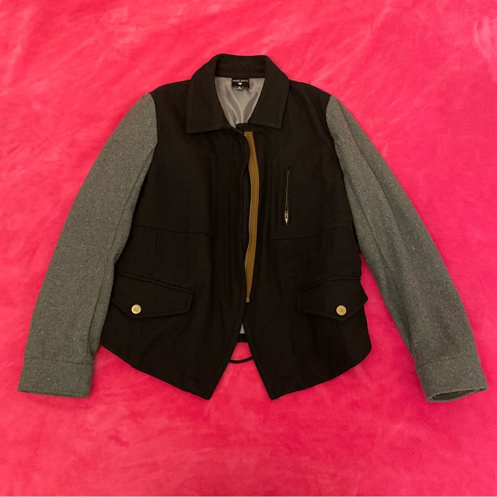 against nudity black and grey jacket